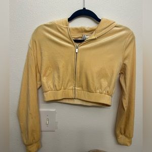 divided yellow cropped zip up sweatshirt